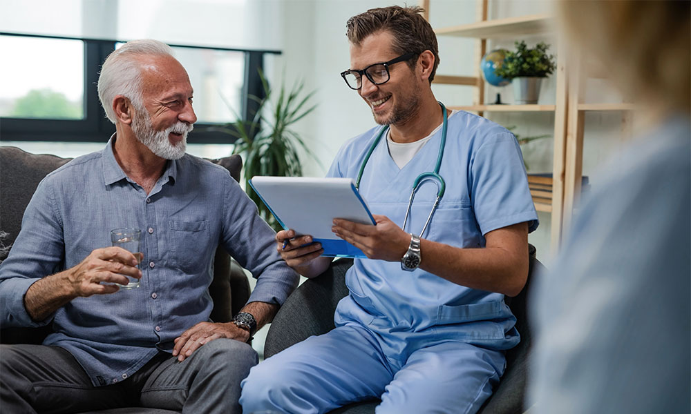 A male doctor speaking with a patient