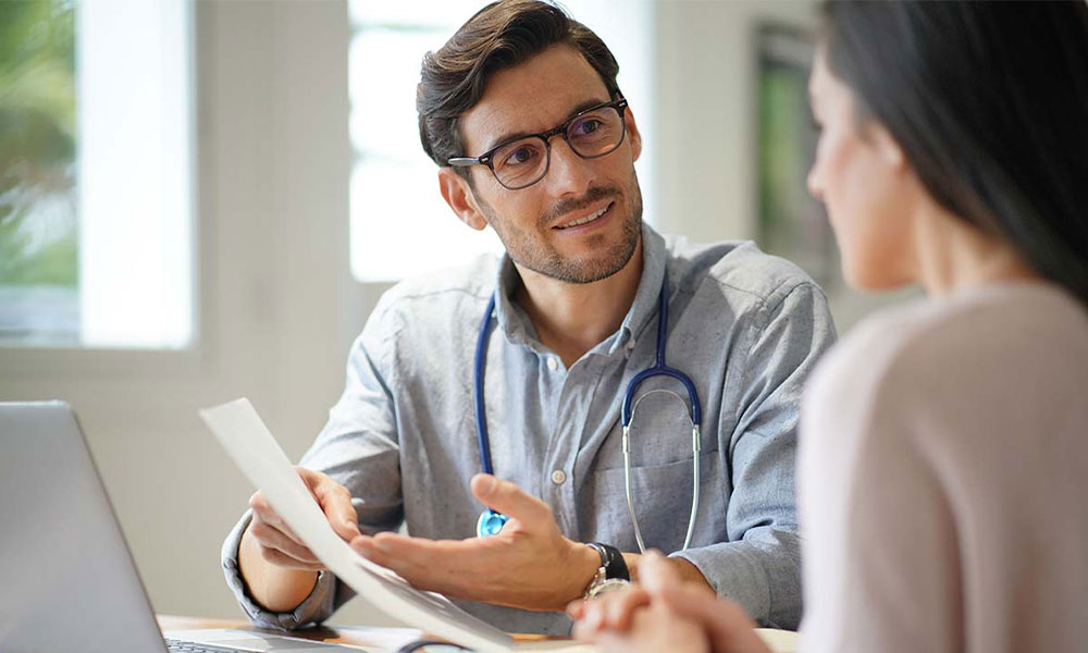 A male doctor and a patient